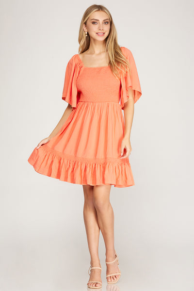 HALF FLUTTER SLEEVE WOVEN SMOCKED DRESS WITH BACK TIED DETAIL